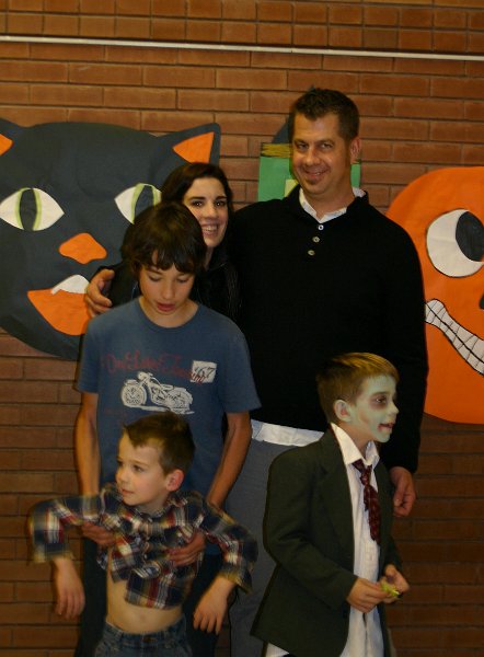 Halloween excitement at Gavin's school kim,john,&boys.jpg